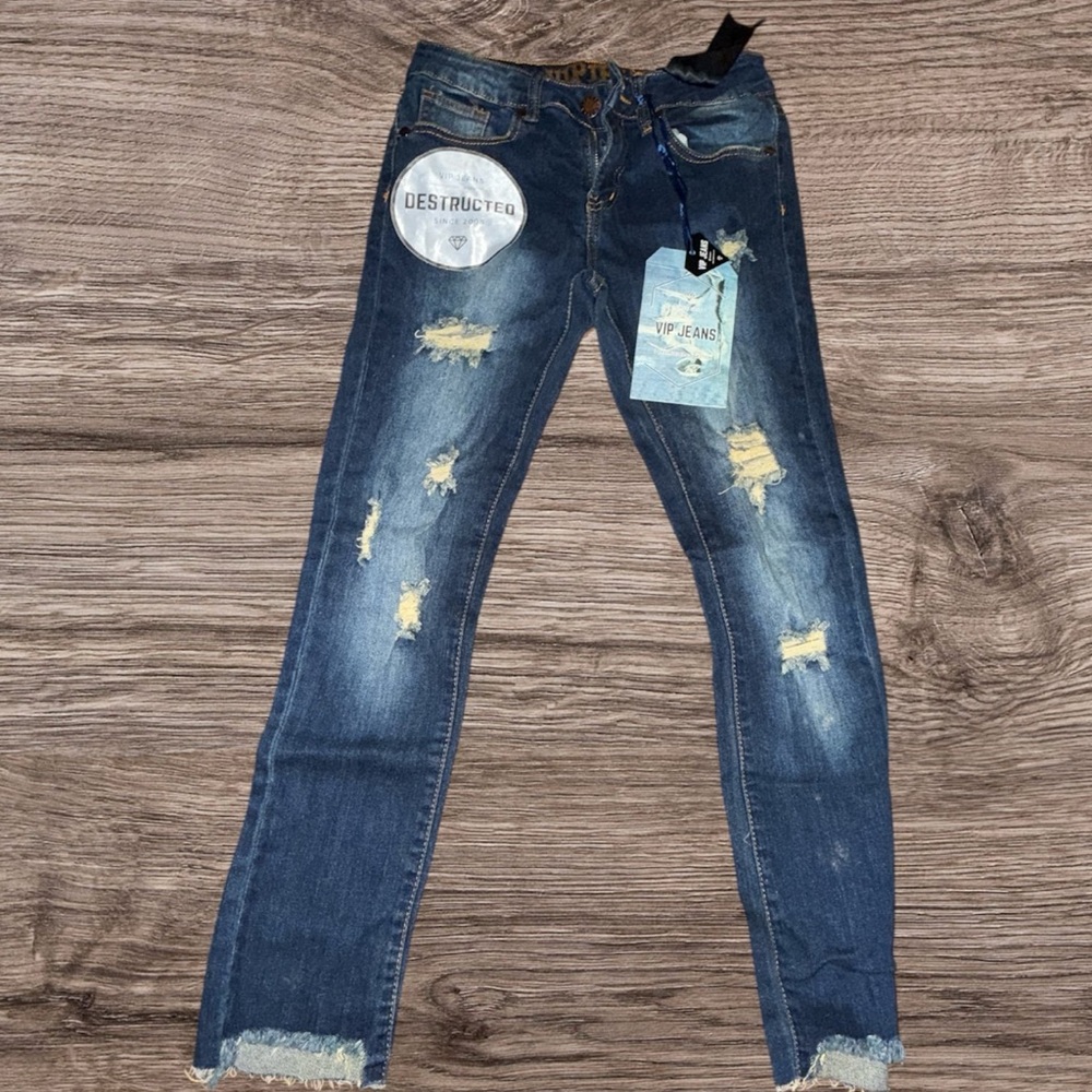 Distressed Blue Jeans